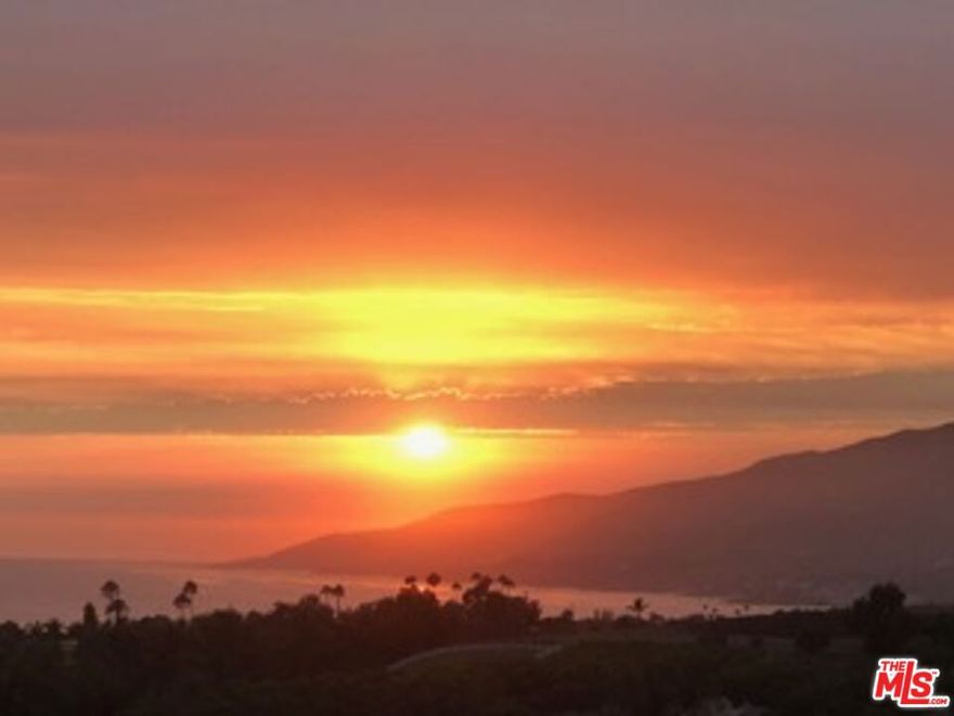 Discover your private retreat in the coveted Point Dume Club, where panoramic ocean and mountain views meet comfort and style. Perched on a hillside, this upgraded home features vaulted ceilings, open flow, and IPE hardwood floors throughout, including the patio deck. The kitchen boasts marble countertops and a new refrigerator and a new dishwasher, while eco-friendly touches include natural cleaning products, a whole-house water filtration system, and reverse osmosis for pure drinking water. Community amenities offer a resort lifestyle with a clubhouse, pool, heated spa, tennis, basketball, and a dog run. Just moments from Zuma and Broad Beach, plus Point Dume and Trancas shopping centers, this secure, gated community offers both peace of mind and convenience. A perfect blend of luxury, health, and sustainability awaits.