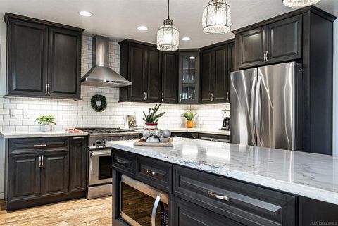 Photo of 8511 Fensmuir St St, San Diego, CA 92123 (MLS # 260008139SD)