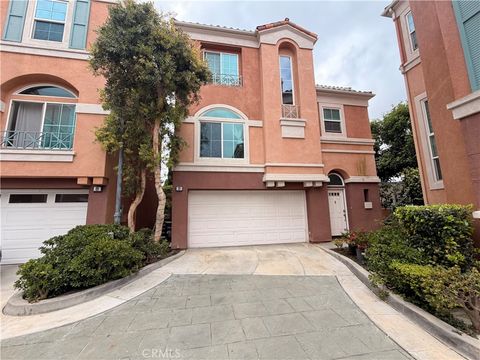 Photo of 9 Medici Aisle, Irvine, CA 92606 (MLS # RS26100419)