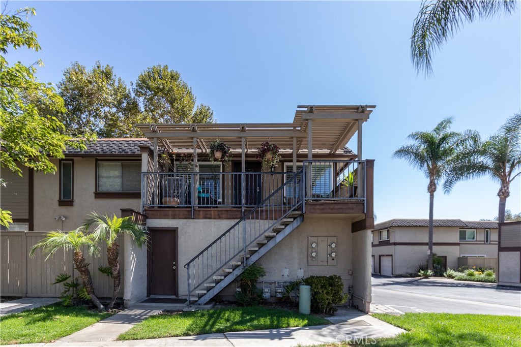 Totally turnkey, upper level end unit located in the Aliso Villas. This is the one you have been waiting for! This 2 bedroom, 1.25 bath shows light and bright with many upgrades. Features include: Brand new paint throughout, along with new vinyl flooring, baseboards and new plantation shutters in the living room, kitchen and both bedrooms. The Jack and Jill bathroom has upgraded shower walls, a tub and two brand new vanities/light fixtures. Beautiful oak (soft close) cabinets in the kitchen, an enclosed pantry with adjustable shelves and the washer, dryer and refrigerator are all included. The master bedroom has a custom walk-in closet that can be configured to your design needs. Other features include: new LED can lighting, ceiling fans in both bedrooms, dual pane windows, an Ecobee smart thermostat, a newer water heater, upgraded a/c unit and a security screen door. The oversized one-car garage includes storage cabinets and overhead storage with a convenient side entry door located at the bottom of the stairs leading to the home. There is also one assigned parking space located near the property. Relax on your covered private patio or enjoy the Community Association Pool, Spa, Playground and Picnic Area nearby. NO-ONE ABOVE or BELOW. Buyers have the option of joining the Lake Mission Viejo Association (LMVA). The property is located in the heart of Mission Viejo, close to schools, shopping, transportation, dining, parks, paths, Lake Mission Viejo and so much more!