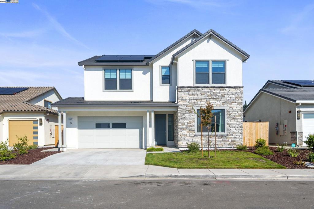 Welcome home to this stunning brand-new build in North Modesto! Built in 2025, this 4-bedroom, 2.5-bath modern home -featuring nearly 2,500 sq. ft. of living space- offers comfort, efficiency, and style. The open-concept layout features all-electric appliances, an energy-efficient design, and fully OWNED SOLAR for long-term savings. The primary suite is conveniently located on the first floor -creating the perfect flow for families or multi-generational living. Upstairs, you’ll find spacious bedrooms and a versatile loft area ideal for work or play. Step outside to a professionally designed $30,000 backyard -with a large lawn -perfect for entertaining or relaxing under the California sun. With NO HOA, this move-in-ready home combines convenience and value. Located close to top-rated schools, parks, shopping (including Costco), and just 2.5 miles from Highway 99 for easy commuting. Don’t miss your chance to own this beautifully upgraded, energy-smart home in one of Modesto’s most desirable neighborhoods!