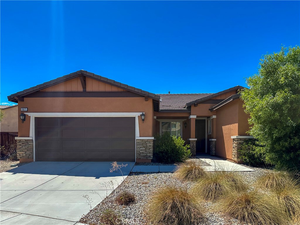 Welcome to 11071 Sundial in Adelanto—a charming single-story home offering 3 spacious bedrooms, 2 full bathrooms, and a functional layout perfect for comfortable living. The open-concept design features a bright living area that flows into a well-equipped kitchen, while the expansive backyard provides ample space for entertaining, gardening, or future expansion. With an attached two-car garage and a wide driveway, parking is a breeze. Conveniently located near schools, parks, and shopping, this property combines suburban tranquility with easy access to major routes.