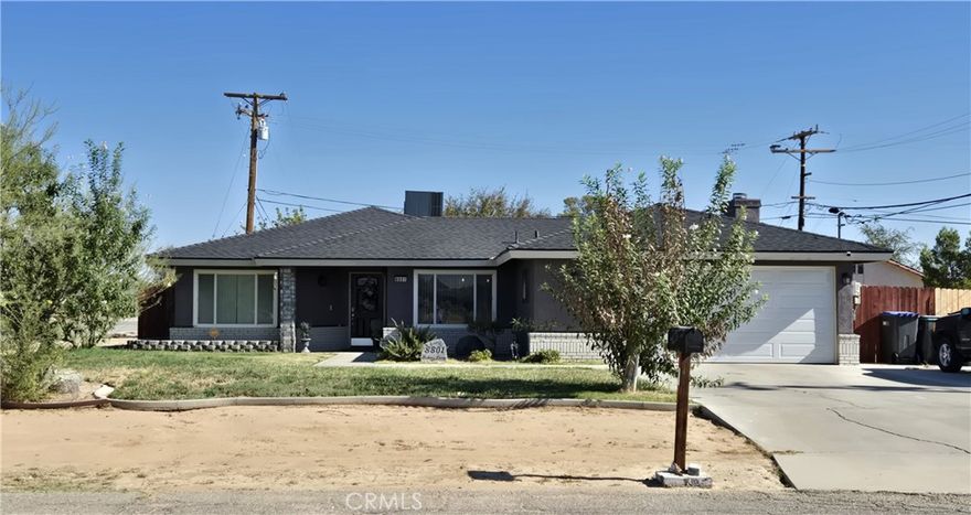 Beautifully updated home. Separate living room and family room with a fireplace. Kitchen has quartz countertops and newer appliances. Loads of storage. Great backyard with large covered patio, built in barbeque, and completely fenced. All you need to do is unpack! See this home today!