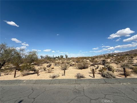 Photo of 12 Indian Cove Road, 29 Palms, CA 92277 (MLS # JT25110566) Photo of 12 Indian Cove Road, 29 Palms, CA 92277 (MLS # JT25110566)
