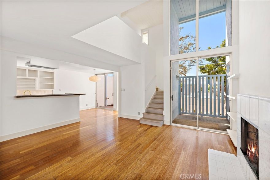 Mid-Century reimagined and recently remodeled, this Newport Shores home offers 3 bedrooms and 2 bathrooms featuring two bedrooms and a full bath upstairs, plus a third bedroom and full bath on the main level. Located on a prime corner lot, the home boasts soaring ceilings, abundant natural light, and bamboo flooring throughout the downstairs. The open-concept living room blends seamlessly with the kitchen and dining area, creating a space perfect for entertaining or everyday living. Seamlessly flow to your private, enclosed backyard and patio, with direct access to a 2-car garage.

Freshly painted inside and out with a newly remodeled upstairs bathroom and flooring, this home is move-in ready with timeless charm and thoughtful updates. Enjoy all the amenities the Newport Shores Community Association has to offer, including a pool, clubhouse, tennis courts, pickleball, volleyball, basketball, BBQ area, playground, beach close and all the amenities of living the Newport Beach lifestyle.