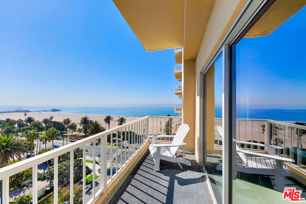 Discover this architecturally striking oceanfront high-rise loft commanding sweeping views of the entire Santa Monica coastline and cityscape from every corner. This meticulously curated residence features premium finishes: cutting-edge appliances, stainless steel feature walls, polished concrete flooring, and soaring raw surface ceilings. Filtered coastal light permeates the open-plan living spaces, crafting an elevated urban sanctuary. The modern-industrial kitchen boasts ample storage, built-in refrigerator, and a raw wood peninsula for food prep and serving. A serving counter with temperature-controlled wine storage elegantly separates the kitchen from the dining area. Guests will enjoy the powder room with pearl tiles, sharp lines, and minimalist designer touches. The living space spills out onto the wraparound terrace revealing commanding views of the entire Santa Monica coastline. The primary suite functions as a private wellness retreat featuring a bespoke closet, a statement elevated soaking tub, oversized steam shower, and an expansive vanity. Coveted Santa Monica address provides immediate access to the 3rd Street Promenade, iconic Santa Monica Pier, world-class beaches, Palisades Park, and instant access to Pacific Coast Highway and I-10 freeway.
