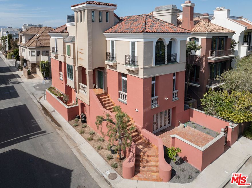 Welcome to this beautifully remodeled 4-bedroom, 3.5-bath Mediterranean-style home located in the  Marina del Rey, just moments from scenic bike paths, the marina, and the sparkling Pacific Ocean. Spanning 3 thoughtfully designed levels & 4th level roof top deck and serviced by a private elevator, this residence offers a perfect blend of luxury, comfort, and coastal living. Step into the spacious living room featuring a cozy fireplace and rich hardwood floors. The formal dining room is ideal for entertaining, while the expansive kitchen has generous counter space perfect for culinary enthusiasts. Retreat to the primary suite with its own fireplace and a spa-like bath plus walk-in closet. Additional fireplaces in the family room and living area add warmth and charm throughout. Generous sized office/den. Enjoy seamless indoor-outdoor living with a large private patio and a stunning rooftop deck offering panoramic views, ideal for sunsets and social gatherings. Additional features include a private 2-car garage plus an additional dedicated parking space, ample storage, and refined finishes throughout. With easy access to boating, the beach, and all the best the Marina has to offer, this exceptional home truly has it all.  Also very close to restaurants, shops, freeways & LAX.