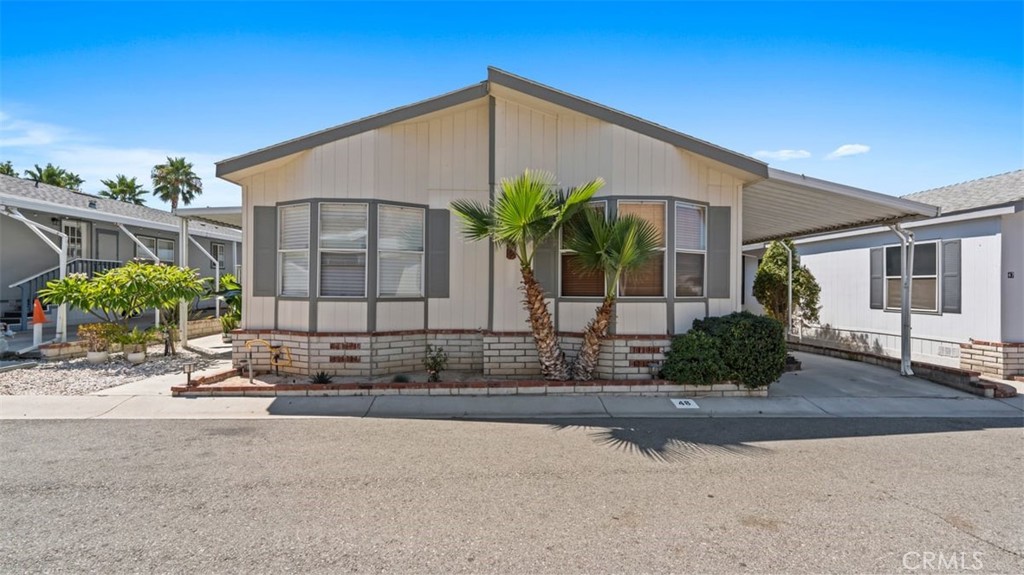 Explore this beautiful home located in the desirable all-ages Santiago Estates community. Step inside to find 4 bedrooms and 2 bathrooms, thoughtfully designed with modern touches and upgrades throughout. The home features new flooring, a filtered water system, an indoor laundry area, and a covered carport with space for multiple vehicles. A welcoming covered patio leads into a spacious living room that flows into the dining area, making it ideal for entertaining. Enjoy a small private yard—perfect for relaxing outdoors—and take advantage of ample storage space. Community amenities offer resort-style living, including a refreshing pool and jacuzzi, playground, basketball court, and a clubhouse—ideal for hosting special events. Conveniently located near the 60 Freeway, you'll enjoy easy access to top-rated schools, shopping, restaurants, and the brand-new Shops at Jurupa Valley, featuring Target, Ross, In-N-Out, Starbucks, Chipotle, a gym, and more. Financing available with as little as 5% down! Experience all this property has to offer- Call today to book your private tour.