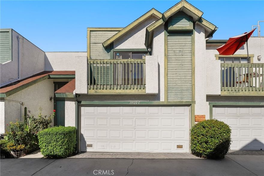 Welcome to Pleasant Valley Townhome, a gated community in Baldwin Park. This inviting residence features laminate wood flooring throughout the main level. The spacious living room offers a cozy brick fireplace and sliding doors that open to the private backyard, seamlessly connecting to the dining area and kitchen. Upstairs, the primary bedroom includes an ensuite bathroom, while two additional bedrooms share a full hall bath. A two-car attached garage provides convenience and extra storage. Enjoy easy access to the 10, 605, and 210 freeways for effortless commuting.