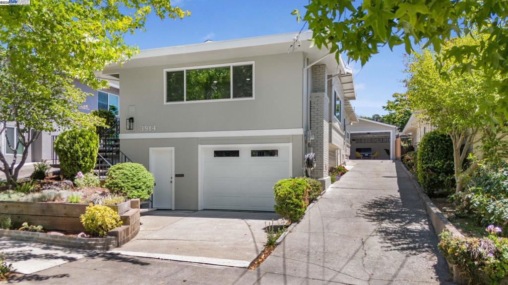 Welcome to 3914 Laguna Ave – A True Gem in the Oakland Hills! This beautifully remodeled home offers 3 luxurious bedrooms and 2 updated bathrooms with about 1,500 square feet of light-filled living space. Big windows bring in tons of natural light and showcase stunning views from every angle. Step into the bright and open living area — perfect for relaxing or entertaining. The chef’s kitchen is a dream come true, featuring modern appliances, stylish finishes, and plenty of space to cook and gather. Enjoy the peaceful, manicured garden — a perfect spot for morning coffee or evening relaxation. The oversized bonus room/workshop is ideal for car lovers, mechanics, or anyone in need of a creative space. Plus, there's an extra-large garage attached, offering lots of storage or even possible rental income. The workshop has all utilities already placed. Lot has parking for about 8 cars Located just minutes from Montclair Village, the Diamond shopping district, and the Grand Lake area — you're close to shops, cafes, and parks, hiking trails, and world class mountain and road bike trails. Don’t miss this move-in-ready beauty with so much to offer. A must-see!