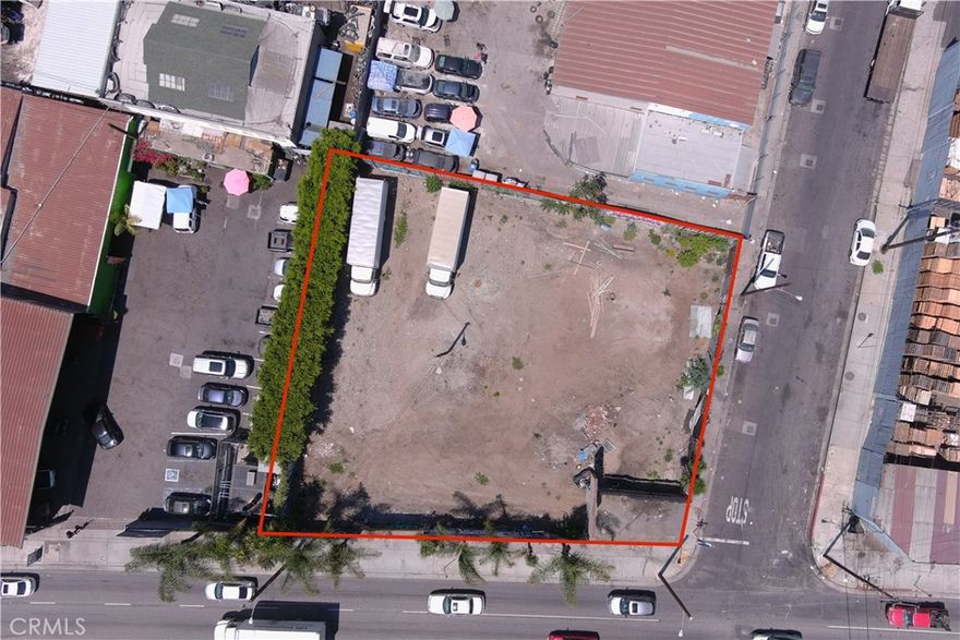 Property is currently used for parking but may be envisioned for the dismantling of automobiles and/or salvage yard.  Location on busy corner lot provided visibility to high volume of traffic flow for this area.  Property is completely fenced with gated entry.