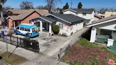 Photo of 1049 W 61st Street, Los Angeles, CA 90044 (MLS # 26662815)