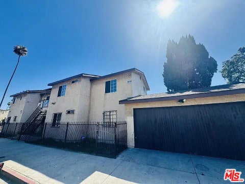 Photo of 7704 S Grand Avenue, Los Angeles, CA 90003 (MLS # 26861589)