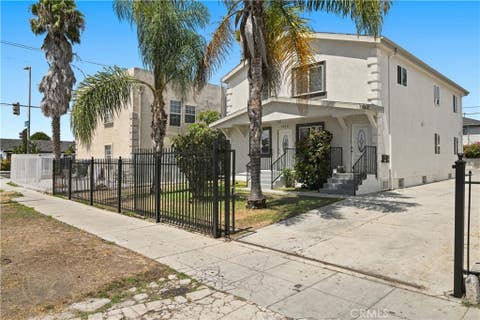 Photo of 1353 W 60th PL, Los Angeles, CA 90044 (MLS # OC26187896)