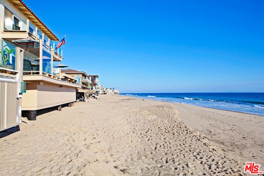 Romantic and spacious beach house with 50 feet of frontage located on the deepest and sandiest section of close-in La Costa Beach. Amazing views up and down the coast from Palos Verdes to Point Dume. Landscaped courtyard entry leads to a large open living room and dining area with high ceilings. Expansive beachfront deck with steps to sand. One bedroom and large convertible den on the main floor. Beautiful master suite with fireplace and oceanfront deck, an additional jr. master on the water plus a third bedroom upstairs. 2 car garage plus 2 additional off street parking spaces in driveway. Amazing opportunity to own one of Malibu's premiere sections of beach!