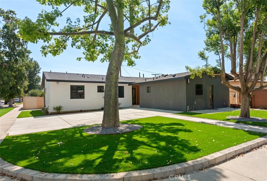 Welcome to 6724 Hesperia Ave, a beautifully reimagined home that has undergone a full- scale renovation, blending modern amenities with timeless charm. This 4 bedroom, 3 bathroom residence features all-new structural work, electrical, and plumbing systems, including a powerful new 400-amp electrical meter and a dedicated gas meter. Step inside to an open concept living room and kitchen, complete with brand new appliances, sleek new flooring, and energy-efficient insulated windows that bathe the home in natural light. Enjoy year round comfort with a brand new A/C system and a tankless water heater. The home also boasts a remodeled front porch and patio, a cozy chimney, and a convenient in-unit washer and dryer. Thoughtful exterior upgrades include refreshed landscaping, designer paint throughout, new light fixtures inside and out, and much much more making this fully rehabbed property a move-in-ready gem in a desirable neighborhood. Need an extra room and privacy this home also offers a junior ADU for an inlaw or guest, fully equipped with full kitchen and bathroom, ask agent for details.