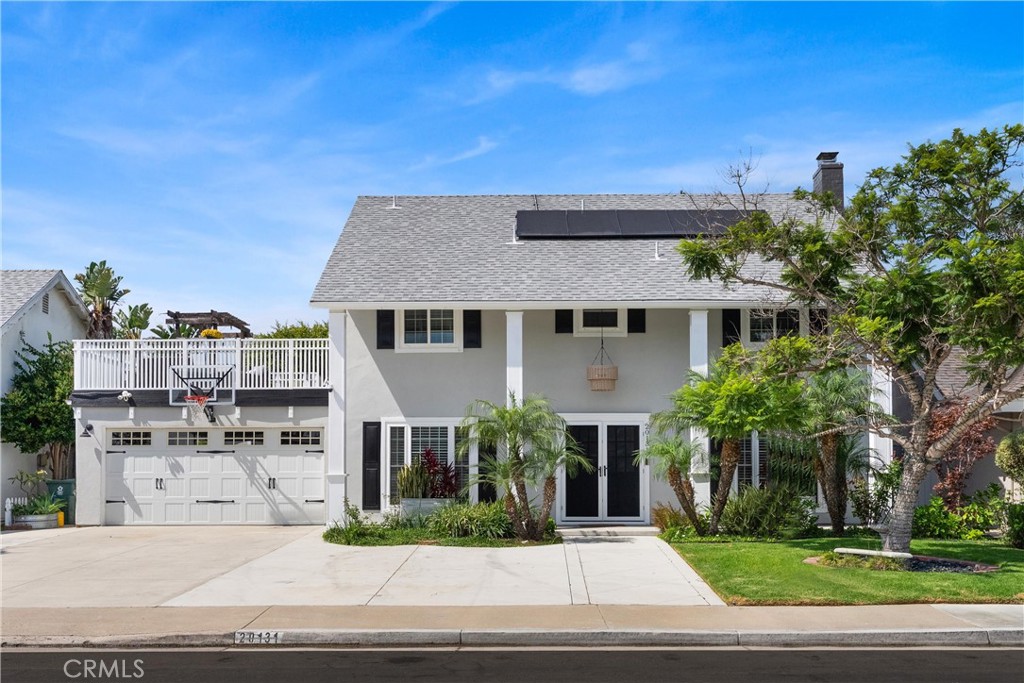 Welcome to 20131 Crown Reef Lane! This beautifully remodeled home offers one of the most sought-after floor plans in the highly desirable Moffett Tract, one of South Huntington Beach’s most requested communities. Just a few streets from Moffett Elementary, it combines timeless curb appeal with modern upgrades and finishes. Inside, you’ll find an open-concept layout that seamlessly connects the living and family areas to a stunning remodeled kitchen. The kitchen boasts crisp quartz countertops, an oversized island, a peninsula with bar seating, custom cabinetry, and a dry bar with a wine fridge—perfect for entertaining. A full downstairs bedroom and bathroom complete the first level, making this home ideal for large families or multi-generational living. Upstairs, three additional bedrooms include an oversized primary retreat with multiple walk-in closets and a spa-inspired bathroom. The private rooftop deck is the perfect spot to enjoy morning coffee at sunrise, evening wine at sunset, or front-row views of the Pacific Airshow and 4th of July fireworks. The backyard is an entertainer’s dream, featuring a custom covered patio with a gas fireplace, BBQ island, lush landscaping, turf, and two versatile sheds—one for storage and the other for use as an office or lounge space. With ample room for a future pool or spa, the possibilities are endless. This home has been extensively upgraded with a newer roof, updated plumbing from the main line, new HVAC and ducting, and an upgraded electrical panel with EV charging. It also includes a temperature-controlled pull-through garage and solar panels, estimated to save thousands on your electric bill—offering true turnkey, low-maintenance living for years to come. Walk to Moffett, Sowers, and Edison schools, or bike to the beach, Pacific City, Downtown Huntington Beach, shopping, and dining. Experience the perfect blend of location, luxury, and lifestyle—all in the heart of South Huntington Beach.