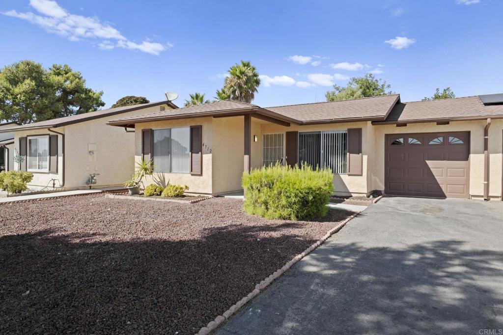 Your Best Value in Peacock Hills Awaits! Welcome to this meticulously updated and move-in-ready 2-bedroom, 2-bathroom gem in the highly desirable 55+ community of Peacock Hills. This spacious 1,269 sq. ft. attached home isn't just beautiful—it boasts the best price per square foot in the entire community, offering unparalleled value for your investment. Step inside and discover a home that has been completely transformed with no detail overlooked. The heart of the home is the stunning new kitchen, featuring sleek modern cabinets, gorgeous new countertops, and a brand-new dishwasher, making meal preparation a joy. The fresh, neutral paint and beautiful new flooring that flows throughout create a bright, airy, and seamless living environment. Enjoy true peace of mind with major updates including a new roof and a full termite clearance, ensuring your investment is protected for years to come. The exterior has also been freshly painted, giving the home fantastic curb appeal. Outside, you'll find your own private oasis. The generously sized backyard is a gardener's delight, offering plenty of space for planting your favorite flowers or vegetables. Meanwhile, the low-maintenance front yard means you can spend less time on chores and more time enjoying the fantastic Oceanside weather and all the amenities the Peacock Hills community has to offer. This is the perfect opportunity to own a worry-free, updated home in a prime location. Don't let this incredible value pass you by!