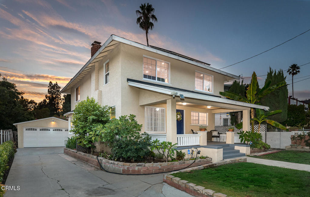 A thoughtfully landscaped front yard with succulents and fruit trees introduces this Pasadena bungalow, blending timeless character with modern updates. The welcoming covered porch opens to a spacious living room anchored by a fireplace and filled with natural light from large windows. Oversized pocket doors lead to the formal dining room with built-in cabinetry, creating a warm and inviting setting. An arched opening with a peninsula connects seamlessly to the expansive kitchen, equipped with stainless steel appliances, a window overlooking the outdoors, and direct access to the backyard.Just beyond the kitchen, a 3/4 bath with dual sinks and a separate water closet with shower opens to a large laundry room, combining function and convenience. A connecting hallway, accessible from both the kitchen and the living room, leads to a bedroom, the staircase to the second floor--illuminated by a large window--and access to the basement, currently staged as a media and creative studio with space for music, streaming, or recreation.The upper level offers four bedrooms, including a spacious primary bedroom. The additional bedrooms provide flexibility for family, guests, or a home office. A walk-in hallway closet and a 3/4 bath complete the second floor.Outdoor living includes an expansive fully covered paved backyard, thoughtfully designed as an all-weather retreat with generous space for lounging, dining, and play. A finished detached garage adds further versatility, ideal as a studio, workshop, or gym.Notable upgrades include solar panels for energy efficiency, a whole-house water softener, newer condenser, refinished wood floors, new attic insulation (2025), new roof (2025), dual-pane windows, and an EV charger outlet.Centrally located, this home is minutes from the Rose Bowl, Brookside Park, Old Town Pasadena, Lake Avenue shopping and dining, Caltech, and cultural landmarks, offering the perfect blend of Pasadena's architectural heritage and modern living.