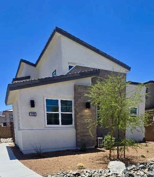Be the first to live in this brand-new, never-before-occupied home located in the sought-after Alara at University Park community in Palm Desert. This Spanish Contemporary style two-story residence offers 4 bedrooms, including a versatile flex room, 2.5 bathrooms, and a 2-car garage with direct access. With 2,004 sq. ft. of thoughtfully designed living space on a 4,073 sq. ft. lot, this home seamlessly blends comfort, functionality, and modern design. The open concept floor plan features a bedroom on the main level, ideal for guests or a home office, along with a guest powder room, spacious great room, courtyard, and a modern kitchen that opens to the dining area and living space. The kitchen is equipped with white cabinetry, quartz countertops, a center island, and stainless-steel appliances including a stove, dishwasher, and microwave. Upstairs, you'll find three additional bedrooms, including a spacious primary suite with a walk-in closet, dual vanities, a walk-in shower, and a linen closet. A loft area, convenient laundry room, and two full bathrooms complete the second floor. Enjoy energy savings with built-in solar panels and the luxury of living in one of Palm Desert's newest communities. As a resident of Alara at University Park, you'll have exclusive access to The Grove, an amenity center featuring a clubhouse, resort-style and lap pools, kiddie pool, spas, fire pits, pickleball courts, a shaded play area, and a large event lawn with a stage for community events.
Surrounded by the scenic San Jacinto Mountains, you'll be perfectly positioned to enjoy hiking, biking, world-class golfing, and easy access to upscale shopping, top-rated PGA golf courses, Downtown Palm Springs, and Palm Springs International Airport. Don’t miss this opportunity to lease a brand-new home in a vibrant, amenity community that offers not just a residence, but a lifestyle!