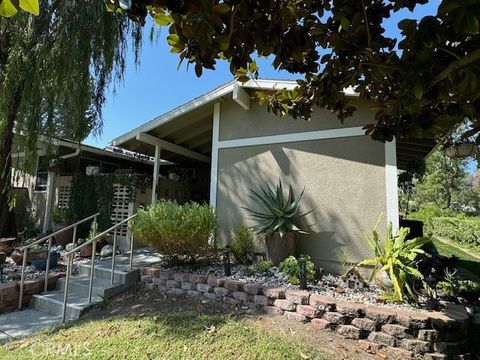 Photo of 406 Avenida Castilla #B, Laguna Woods, CA 92637 (MLS # OC25174800)