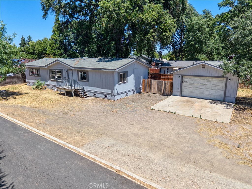 This beautifully maintained 4-bedroom, 2-bath manufactured home sits on a large, level, fenced corner lot in the heart of Clearlake—just minutes from schools, parks, and shopping.
Includes detached 2-Car Garage + Large Paved Driveway.
Fully fenced private back yard with GIANT Oak Tree.
Home Features:
Bright and spacious living and dining rooms.
Generous kitchen with ample cabinet space.
Separate laundry room.
City water and sewer connections.
Quiet, newly paved streets in a walkable neighborhood.
Enjoy peace and privacy under the shade of a majestic oak tree in the backyard—perfect for relaxing afternoons or weekend gatherings. All this, just a short stroll to the post office, shopping center, and local parks.
This move-in-ready home won’t last long—schedule your showing today!