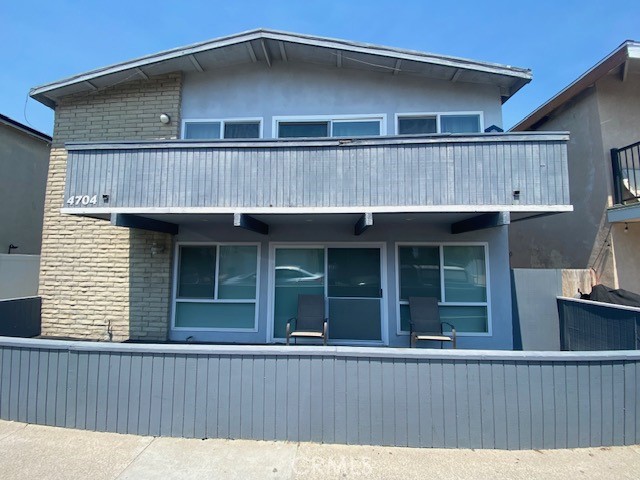 This property is centrally located to the pier and main Street area of Newport Beach it is also located a few steps away to the beach and has a peek a boo view of the ocean. This is a duplex that also has short term rental permit this can provide investment opportunity and multi-functional living for personal enjoyment. The downstairs has a 2 bedroom 1 one bath with its own patio and upstairs has 4-bedrooms, 2 bathrooms with 2 patios to enjoy the views. Both have kitchens and living rooms with formal dining areas. This can be used as a multi- family living or investment property and as a short-term rental.