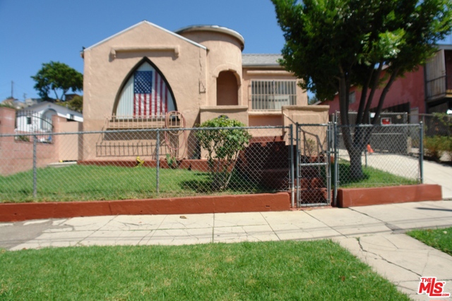 Three charming units in the hot Boyle Heights neighborhood super close to LAC-USC Medical Center & Cal State L.A. Features include living rooms with faux fireplaces & barrel ceilings, large formal dining rooms, eat-in kitchens, & separate laundry rooms. The 2 occupied units have the interior space to possibly create a 2nd bedroom thereby increasing your rental income potential. All units are separately metered for electricity & gas. The front house and 3 separate garages in the rear shall be delivered vacant. Garages previously rented separately for additional income! BONUS: Downtown skyline & mountain views from rear of property!