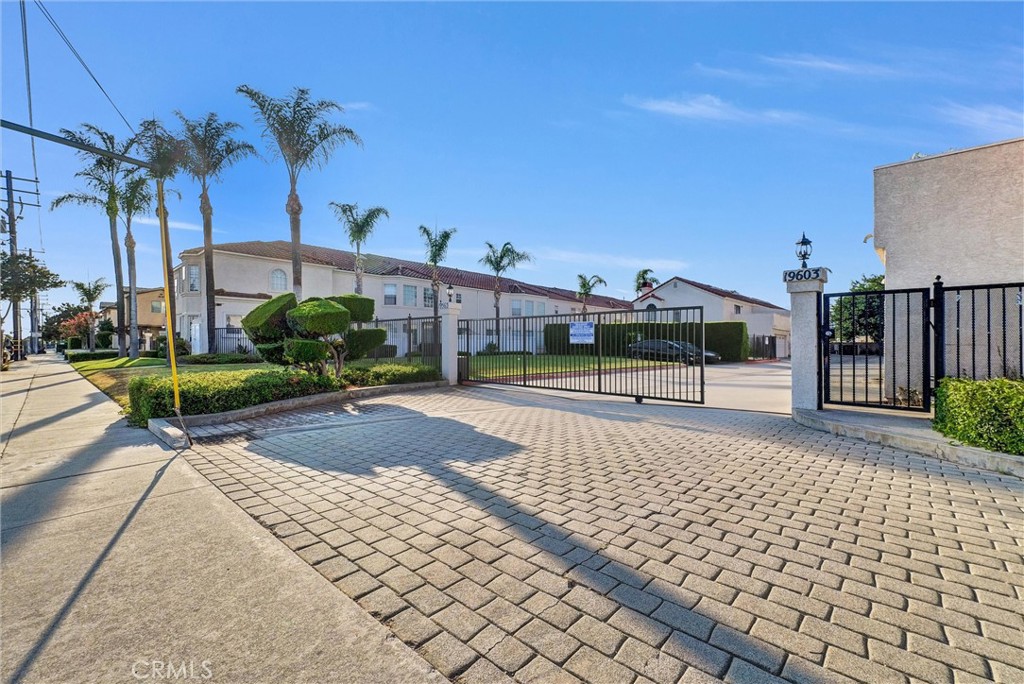 This renovated 3-bedroom condo has beautiful fixtures & finishes, along with lots of storage and a great location. The unit has a private front courtyard where you can grill up dinner or enjoy a quiet cup of coffee in the morning.
When you enter through the front door, you'll find an open layout with fresh paint, recessed lighting, wide-plank LVP flooring (no carpets here), a cozy fireplace and two big windows that fill the main level with natural light.
The renovated kitchen features stunning quartz countertops, white Shaker cabinetry, stainless appliances, a workstation sink, a dining nook and a breakfast bar overlooking the living room.
The main floor also offers a powder room and has direct access to the 2-car garage – which includes plenty of storage space & the laundry area.
Upstairs, you'll find the bedrooms plus a large loft that includes a skylight and floor-to-ceiling built-in storage.
The primary bedroom boasts a spacious ensuite with dual sinks and a step-in glass shower. The guest rooms down the hall both have ceiling fans & ample closet space.
This quiet condo community has a gated entry and offers residents amenities like a community pool, meticulously landscaped grounds & guest parking. You'll be just 2 minutes from all the shopping & dining along N Azusa Ave., with top-ranked schools all less than a mile from your front door. You can hop on both the 10 & 210 Fwys in less than 5 mins, or take the MetroLink (5 mins away) for an easy commute!