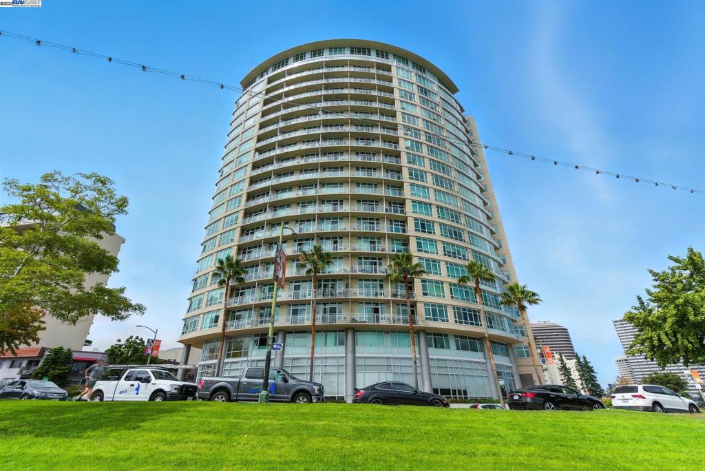 Welcome to this stunning 10th-floor residence at The Essex, where vibrant city living meets panoramic views of Lake Merritt. This 666 sq. ft. junior one-bedroom home offers a sleek layout with abundant natural light, a private balcony, and a spacious walk-in closet. Modern conveniences include in-unit laundry and a dedicated parking space, all within a community designed for style and comfort. The Essex lifestyle goes beyond your front door: enjoy a state-of-the-art fitness center, an outdoor pool, jacuzzi, and chic clubhouse for gatherings. Additional amenities include 24-hour concierge, a conference room, business center, and stylish lounge. VA-approved community with potential first-time homebuyer grant programs available, ask for details (Buyer to Verify and Qualify). Experience luxury, convenience, and an unbeatable location in the heart of Lake Merritt Oakland. Come see it for yourself today! Images have been digitally enhanced or staged and furnishing and decor are shown for illustrative purposes.
