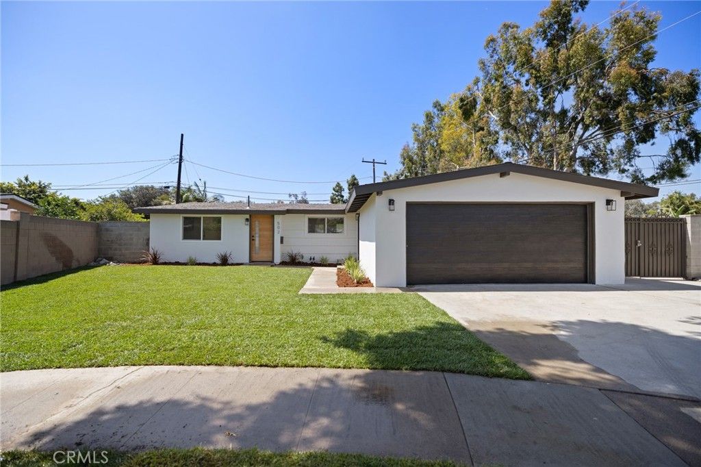 Photo of 502 E Russell Ave, Santa Ana, CA 92707 (MLS # CV26091004)