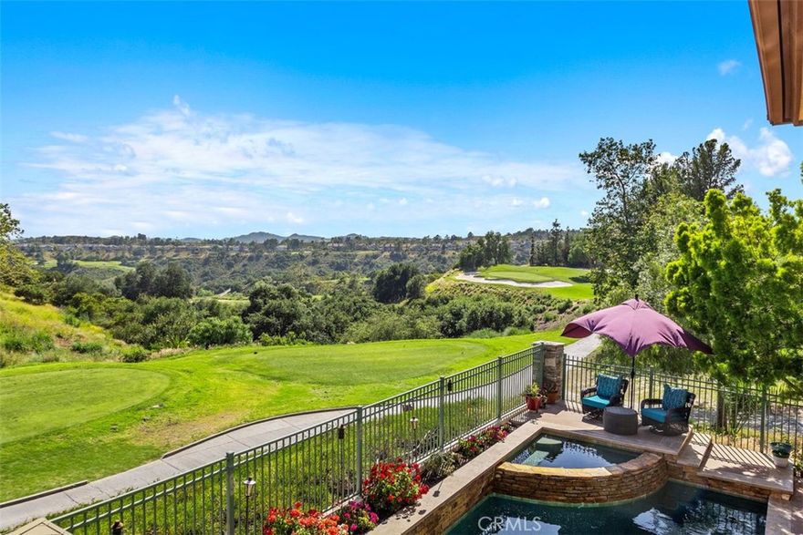 Stunning Pool Home with Golf Course & Mountain Views! This meticulously maintained 4-bedroom plus an office and bonus room, 4.5-bathroom residence offers an exceptional lifestyle. The retreat can be converted into a fifth bedroom for added convenience. Enter to discover a bright and airy formal living and dining area with soaring ceilings and picturesque windows. The gourmet kitchen boasts a walk-in pantry, double ovens, center island with wine fridge, and breakfast bar overlooking the sparkling pool. The adjacent family room features a fireplace and built-in entertainment center. The main-level is complete with a bedroom with ensuite bath, powder room, laundry room, and 3-car garage for added convenience. Upstairs, find a grand primary suite with an office, balcony, and luxurious bathroom with a walk-in shower, soaking tub, dual sinks, and dual-access walk-in closet. Two additional bedrooms, two bathrooms, and a bonus room complete the upper level. The entertainer's backyard is a true oasis with a pool, spa, comfortable seating, built-in BBQ with bar, and kegerator. Enjoy scenic golf course and mountain views from this desirable property. Property has Leased Solar. Located within a prestigious 24-hour guard-gated community, and as a resident of Dove Canyon, you’ll enjoy access to a Jr. Olympic pool, tennis courts, pickleball court, sport court, playground, and scenic trails with access to hiking, biking and horse trails. You will also have the option to join Dove Canyon Golf Club, a Jack Nicklaus Signature design with dining, wine room, gym and more.