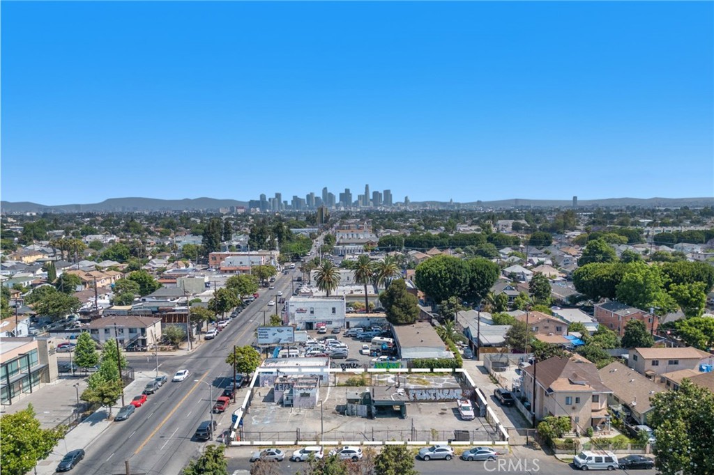 We are pleased to present this incredible opportunity to acquire a highly visible corner property in the heart of South Los Angeles—available for the first time in over five decades. This expansive 13,600 SF rectangular lot spans three contiguous parcels and is prominently positioned at the intersection of S Central Ave and 57th Street, offering outstanding exposure and consistent traffic flow. Zoned C2-1-CPIO, the property allows for versatile development options, including commercial or mixed-use projects. With alley access at the rear and potential ingress/egress on all three sides, the site layout offers excellent flexibility for future development. Formerly a Snack Shack restaurant, this site is ideal for a restaurant, drive-thru, retail space, or a ground-up redevelopment. Located just minutes from both the 110 and 10 Freeways, the property provides easy access throughout the region.