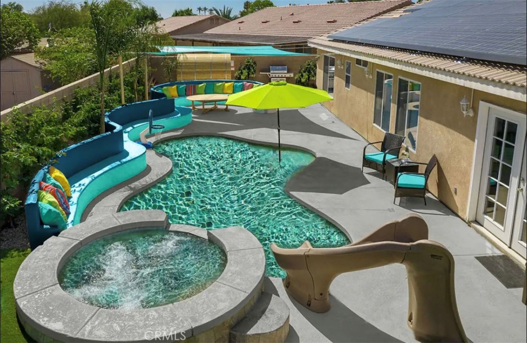 Welcome to this amazing investment opportunity which could also make a lovely primary or secondary home! Single level turnkey Tuscan-style fully furnished and equipped house offers 4 bedrooms, 3 renovated baths, spacious open-floor plan with great room, family room and dining area, beautiful resort-style backyard features lagoon-style pebble pool, jacuzzi, waterslide, concrete built-in oversized bench, Sauna Booth, artificial grass area with kids Playground structure and shaded Gazebo pergola. Currently an active short-term rental with NO HOA`s, this vacation rental is ready for the savvy investor looking to generate passive income with all of the amenities to attract festivalgoers and vacationers year-round! Minutes away from Coachella and Stagecoach Fairground, less than 10 minutes to PGA West, 30 minutes to Palm Springs and 1-hour to Joshua Tree. All furniture and appliances are included, featuring washer & dryer, dishwasher, oven-range and fridge. Leased Solar system to help you save on your electricity bills, smart- remotely controlled pool system with new equipment and smart door lock with Ring doorbell.