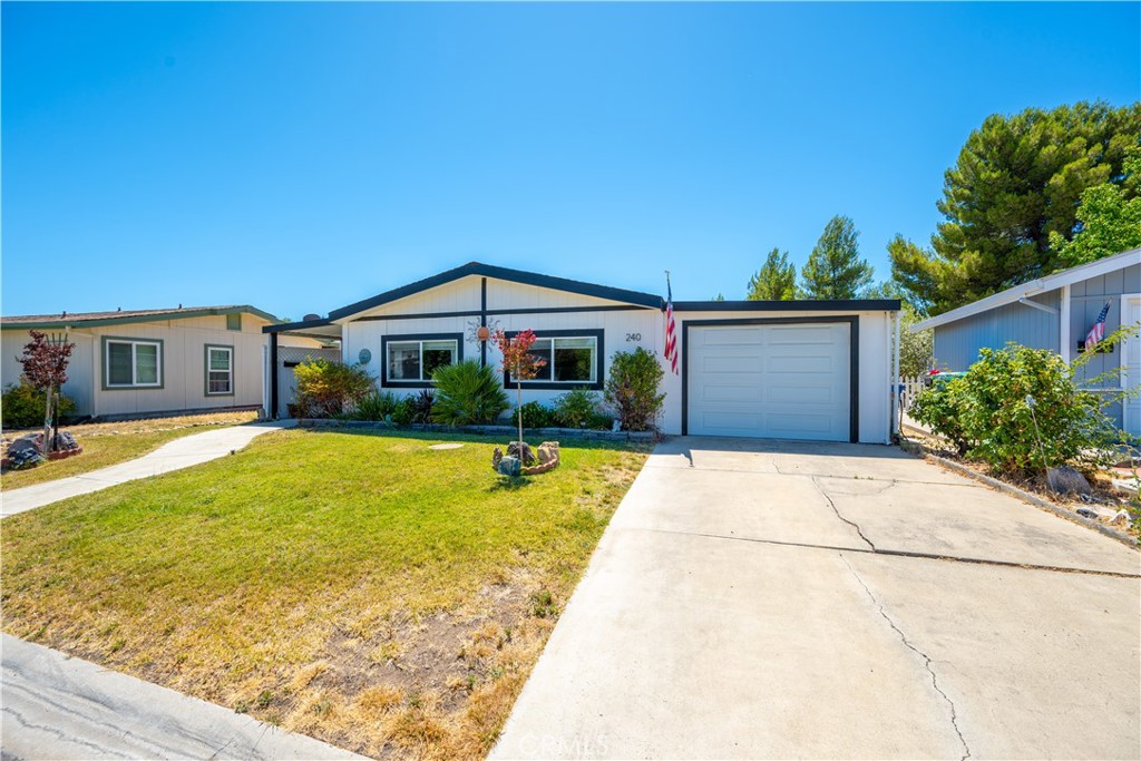 Single level home in the Quail Run Estates 55+ Senior Community on one of the biggest lots the park has to offer and owned land! Completely remodeled over the last few years and sits on 6500 well appointed square feet, offering lots of space for outdoor living and entertaining. As you walk through the front door, you are greeted by an expansive open floor plan with a kitchen, living room and dining room. The kitchen offers quartz countertops, hood and range and newer sink and dishwasher washer, with lots of counter space for your cooking and food preparing needs and also a farmhouse sink. Ample cabinetry is offered in the kitchen, giving plenty of storage space for kitchen items. The hallway is off of the kitchen and leads you to a guest room and ensuite bathroom, with the back of the home offering the large master room equip with it's own full bath and walk in closet. The home also offers a separate laundry room with newer washer and dryer, with extra storage in the laundry room. The backyard offers a large newer pergola giving offering a shady spot to relax and lots of open space for your gardening needs and wants. The home also provides a 1 car garage with a large attached shed directly behind the garage for extra storage needs. Along with another detached storage shed in the backyard for gardening tools and extra storage. Come see this beautiful manufactured home on owned land before it is gone!