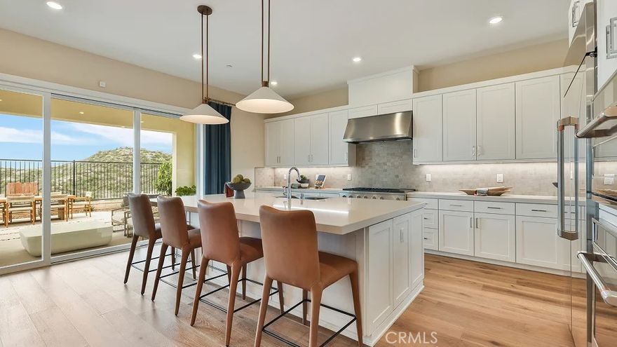 This expansive two-story home offers plenty of space with a total of 4 bedrooms with one of the bedrooms located downstairs with its own private bathroom. The first floor also offers flex space. The rest of the first floor features an open layout from the modern kitchen that offers white cabinetry throughout, massive walk in pantry.  The family room opens to a covered California Room ideal for indoor-outdoor living.   The second floor hosts a laundry room along with three more bedrooms and a bonus room. The luxe owner's suite has a large walk in closet.