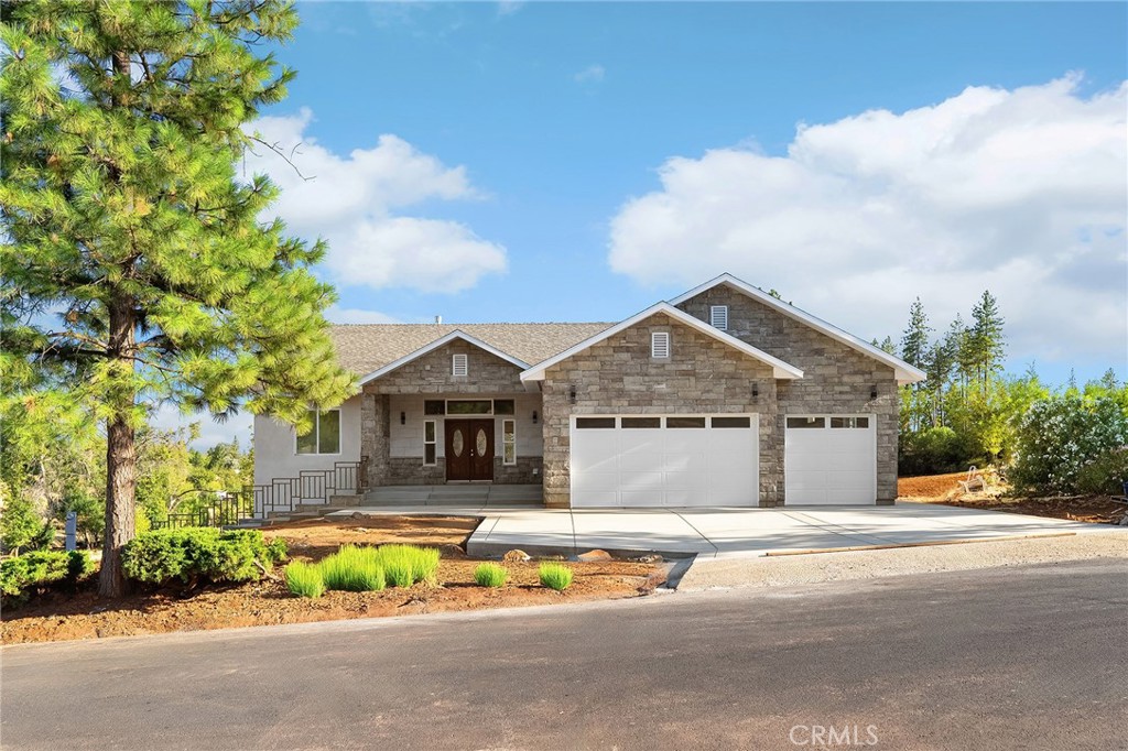 Live the Paradise Lifestyle in This Stunning New Build!
Welcome to your dream home—a luxurious 3,417 sq ft split-level stunner nestled on a spacious .46-acre lot in one of Paradise’s most sought-after neighborhoods. This beautifully designed home is nearly complete and ready to impress with high-end finishes, smart features, and thoughtful details throughout.
Step inside to find gorgeous 3/4-inch white oak hardwood flooring, with bamboo in the bathrooms and laundry areas for a natural, stylish touch. The open-concept layout is perfect for entertaining, with recessed high-efficiency ductless HVAC systems planned in every room to keep you comfortable in every season.
The main kitchen is a chef’s dream—expansive and elegant, featuring a massive island with an eating bar and views of the oversized backyard. Plus, enjoy the convenience of a second full kitchen on the lower level, ideal for extended family, entertaining, or future flexibility.
Two luxurious en-suites—one on each level—offer privacy and comfort, with bathrooms showcasing imported Italian porcelain tile, soaking tubs, and walk-in showers. Relax by either of the two fireplaces, including a double-sided fireplace that warms both the lower living room and the downstairs primary suite.
Enjoy added functionality with laundry rooms on both levels, spacious bedrooms upstairs, and a nearly 400 sq ft balcony overlooking the peaceful backyard—perfect for morning coffee or evening unwinding.
The lower level is full of possibilities, whether you envision a private guest retreat, an ADU, or a cozy lounge. You’ll also find a 465 sq ft unfinished bonus room ready to become a workshop, game room, or wine cellar, and a 450 sq ft patio with triple ceiling fans to enjoy outdoor living in comfort.
Built to stand the test of time, this home features a solid-core double wall block foundation, extra-thick stucco, and charcoal attic venting engineered for added fire resistance. An oversized 3-car garage includes generous overhead storage, accessible from both the garage and the upstairs laundry.
This is more than just a home—it’s your next-level lifestyle. Don’t miss your chance to own a one-of-a-kind residence in a prime Paradise location. Call today to schedule your private tour and experience everything this exceptional home has to offer!