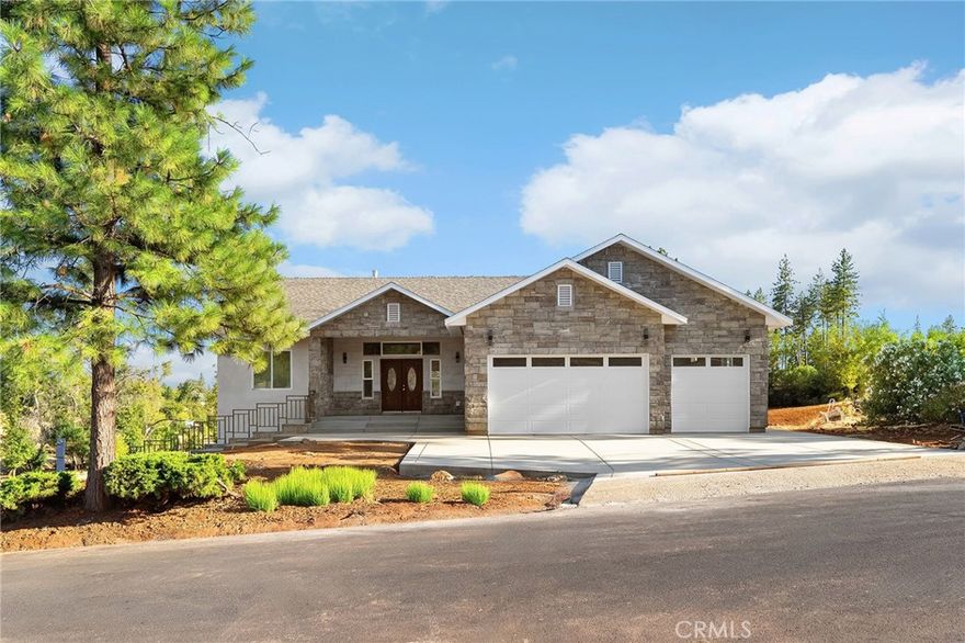 Live the Paradise Lifestyle in This Stunning New Build!
Welcome to your dream home—a luxurious 3,417 sq ft split-level stunner nestled on a spacious .46-acre lot in one of Paradise’s most sought-after neighborhoods. This beautifully designed home is nearly complete and ready to impress with high-end finishes, smart features, and thoughtful details throughout.
Step inside to find gorgeous 3/4-inch white oak hardwood flooring, with bamboo in the bathrooms and laundry areas for a natural, stylish touch. The open-concept layout is perfect for entertaining, with recessed high-efficiency ductless HVAC systems planned in every room to keep you comfortable in every season.
The main kitchen is a chef’s dream—expansive and elegant, featuring a massive island with an eating bar and views of the oversized backyard. Plus, enjoy the convenience of a second full kitchen on the lower level, ideal for extended family, entertaining, or future flexibility.
Two luxurious en-suites—one on each level—offer privacy and comfort, with bathrooms showcasing imported Italian porcelain tile, soaking tubs, and walk-in showers. Relax by either of the two fireplaces, including a double-sided fireplace that warms both the lower living room and the downstairs primary suite.
Enjoy added functionality with laundry rooms on both levels, spacious bedrooms upstairs, and a nearly 400 sq ft balcony overlooking the peaceful backyard—perfect for morning coffee or evening unwinding.
The lower level is full of possibilities, whether you envision a private guest retreat, an ADU, or a cozy lounge. You’ll also find a 465 sq ft unfinished bonus room ready to become a workshop, game room, or wine cellar, and a 450 sq ft patio with triple ceiling fans to enjoy outdoor living in comfort.
Built to stand the test of time, this home features a solid-core double wall block foundation, extra-thick stucco, and charcoal attic venting engineered for added fire resistance. An oversized 3-car garage includes generous overhead storage, accessible from both the garage and the upstairs laundry.
This is more than just a home—it’s your next-level lifestyle. Don’t miss your chance to own a one-of-a-kind residence in a prime Paradise location. Call today to schedule your private tour and experience everything this exceptional home has to offer!