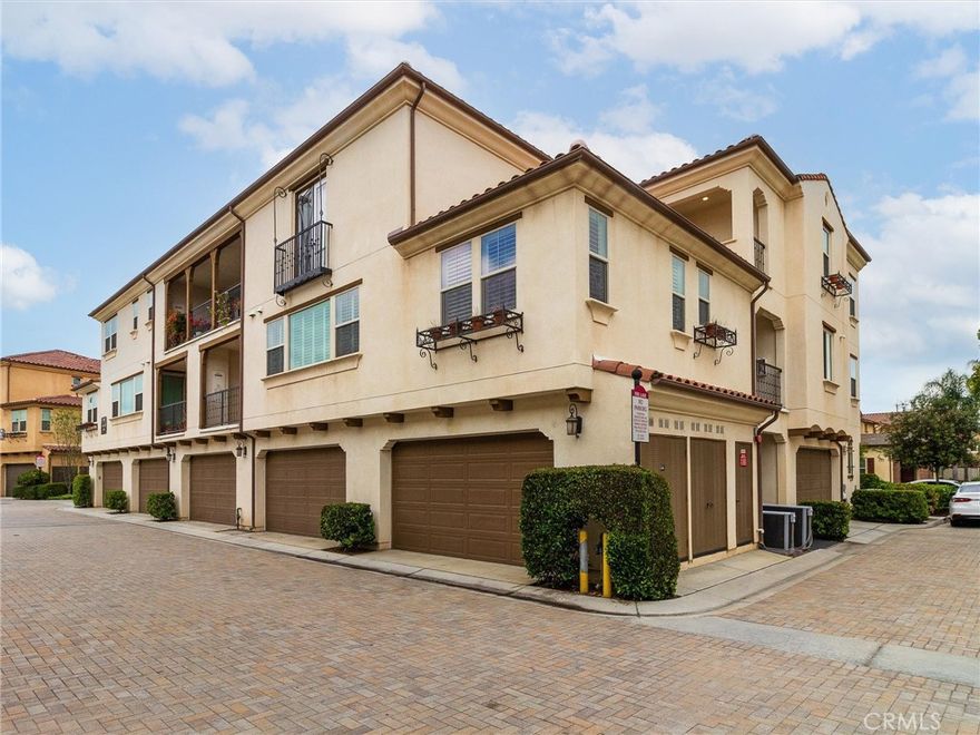 NOW PRICED BELOW THE APPRAISED VALUE! Live the lifestyle you deserve in this beautifully upgraded 2-bedroom, 2-bath condo, perfectly located in the vibrant, Spanish/Mediterranean-style community of La Floresta! Built in 2015 and originally the showcase model home by Van Daele Homes, this stunning second-floor residence offers effortless, single-level living with elevator access and a private 2-car garage.

Step inside to find designer touches at every turn—engineered hardwood floors, soaring 9-foot ceilings, custom built-ins, plantation shutters, and stylish two-tone paint. The chef’s kitchen shines with quartz countertops, upgraded cabinetry, pendant lighting, and stainless-steel appliances. Relax in the luxurious primary suite featuring a spa-style step-in shower and premium tile finishes. Wired surround sound, crown molding, and a tankless water heater add to the home’s impressive list of upgrades. Home is also equipped with surround sound speakers and a security system.

As a resident, you’ll enjoy resort-style amenities at the Swim and Play Club, including a sparkling pool, spa, BBQ areas, cozy fire pit, and a flexible clubhouse for private gatherings. Best of all, you’re just steps from Whole Foods, top dining, shopping, and more!

Don’t miss your chance to own this show-stopping home in one of Brea’s most desirable communities—schedule your private tour today!