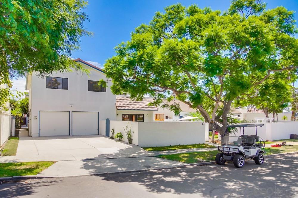 Well away from the mixed-zoning bustle of Orange Avenue, the uniquely open intersection of Palm and G adds privacy for nearby homes and greatly decreases the influence of traffic from 4th Street. 349-351 G is a Coronado Village 2-on-1 that was built with maximum size and efficiency in mind and it is absolutely primed for easy value-add improvement. The 7000sqft R1B lot offers a very rarely seen configuration: a double-wide driveway off of G Avenue as well as drive-in alley access for the rear unit; so both homes have attached garages and private entry. With construction costs rising and city requirements looming, having two well-designed, large structures in place with ample parking pays quick dividends (although you can re-develop entirely and build two new side-by-side homes - buyer to verify). The front home is a large 3042sqft 4BD/2.5BA home built in 1986 and features an expansive and mostly open downstairs with 2 sliding windows to enclosed outdoor spaces, large bedrooms, a generous west-facing upstairs balcony patio, and a two-car garage with 4 driveway spots! The rear home is a 1592sqft rent-ready 3BD/1.5BA built in 1960 with single garage and alley parking. It was renovated in 2024: new roof, new stucco, new floors, and new paint. Between both homes, that's a whopping 4634sqft of livable space, or 66% FAR! Whether living in one and renting the other, cash-flowing both homes as an investor, re-developing into two new homes, or turning the entire property into a memory-making family compound, you have a massive head start towards strong equity and generational wealth.