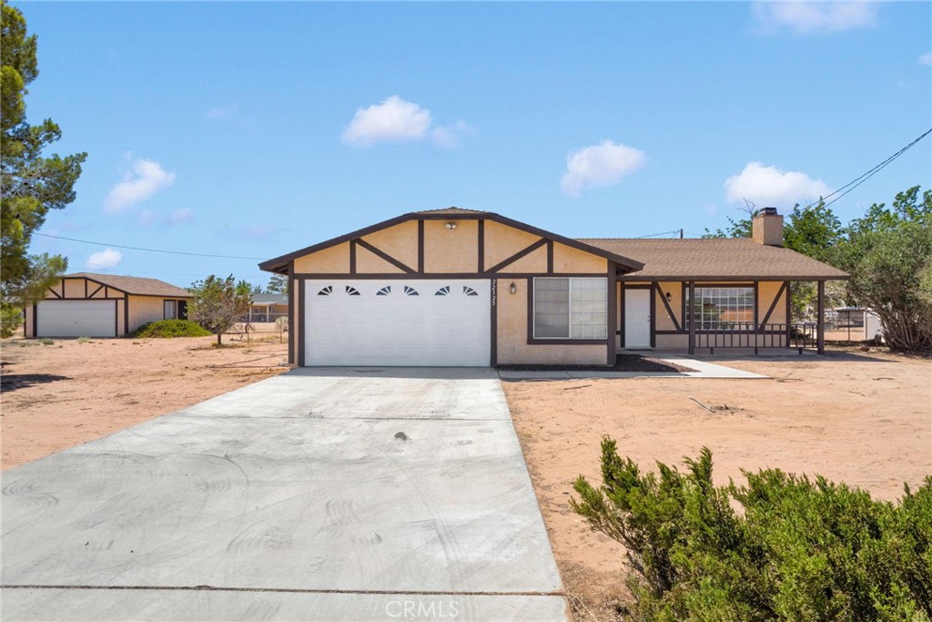 WELCOME TO THIS NEW LISTING IN APPLE VALLEY NEAR GRANITE HILLS HIGH SCHOOL. THE HOME HAS 4 BEDROOMS AND 2 FULL BATHROOMS ALL SITTING ON OVER 1/2 ACRE. WALK UP TO THE COVERED FRONT PATIO OF THIS RECENTLY REMODELED HOME WITH NEW FLOORING, RECESS LIGHTING, BASEBOARDS AND MORE. THE LIVING ROOM HAS TALL CEILINGS AND A FIREPLACE AND IS OPEN TO THE KITCHEN. OFF THE KITCHEN SITS THE DINING AREA AND A COVERED PATIO WITH MATURE SHRUBS FOR PRIVACY. THE QUIET NEIGHBORHOOD IS IN A CUL-DE-SAC WITH AN ATTACHED 2 CAR OVERSIZED GARAGE BIG ENOUGH TO FIT A 3RD CAR OR EXTRA STORAGE. WALK TO THE BACK OF THE PROPERTY TO THE DETACHED 2 CAR GARAGE PERFECT FOR A WORKSHOP OR CONVERT TO AN ADU FOR A MOTHER-IN-LAWS QUARTERS OR RENTAL.