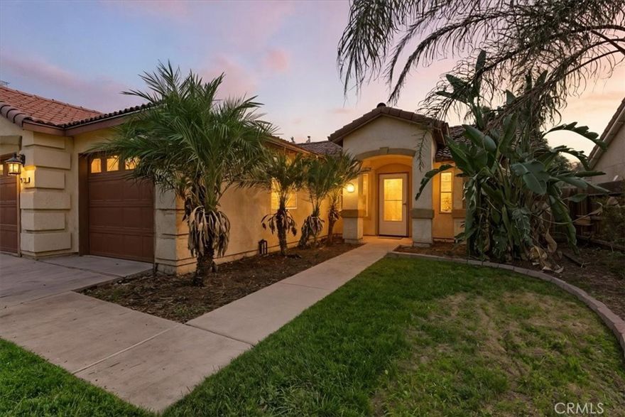 Welcome to 1411 W Bella Oaks Way, a charming and move-in-ready home located in The Vineyard, one of Hanford's most desirable and family-friendly neighborhoods. This beautifully maintained 3-bedroom, 2-bathroom residence offers the perfect blend of comfort, style, and convenience.    Step inside to discover a spacious open-concept living area with modern vinyl flooring throughout, perfect for both everyday living and entertaining. The kitchen provides ample cabinetry and counter space, flowing seamlessly into the dining and living areas for a bright and inviting feel. The primary suite is a relaxing retreat with a generous walk-in closet and a private bathroom featuring a shower and tub combo for ultimate comfort.    The backyard is designed for enjoyment  complete with a gazebo, perfect for outdoor dining, barbecues, or simply relaxing on warm Central Valley evenings. Additional highlights include a 3-car garage offering plenty of parking and storage space, and a prime location within walking distance of a local park, ideal for morning walks, picnics, or playtime.    Don't miss your opportunity to own a beautiful home in The Vineyard  where comfort, convenience, and community come together.