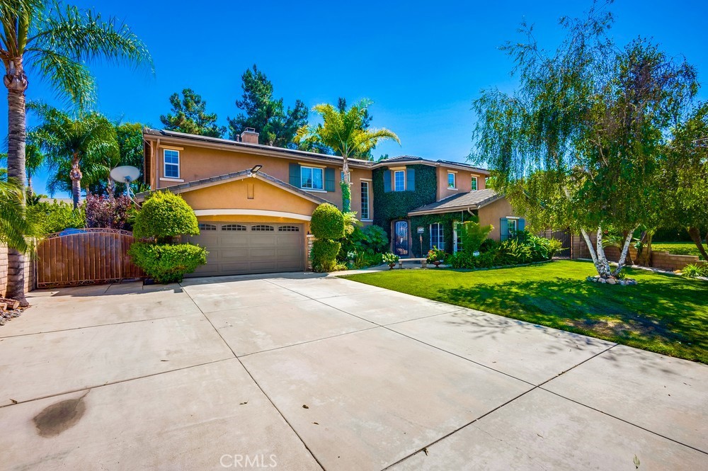 Welcome to the forever home you have been searching for. Enter the gorgeous front door and notice the custom iron screen door that can be closed and separates from door, an elegant touch to visiting guests. A versatile floor plan 5 bedroom (4 up 1 down) 3 bathrooms Primary bedroom includes his and her walk in closets and soaking tub and shower. There is also an additional den now used as music room. Perfectly suited for that growing family. The 3rd car garage was made into an office at time of purchase as it was an option, perfect for those that work at home or need live-in care for children or elderly family member. Office has its own separate entrance. Downstairs flooring is engineered hardwood flooring. Upstairs is an additional loft area for a 2nd at home worker. The downstairs family room off the kitchen is perfect for entertaining and lounging. The kitchen has a French country flair complete with butlers pantry, prep Island, and Dining area. Outdoor Oasis ,complete with Stone waterfall and slide and jacuzzi and built in gas plumbed bar as well as gas plumbed sand pit. Relax in the shady covered patio area or splash in the pool and spa. This quiet cul-de-sac location with its 13,939 spacious lot allows for multiple parking as well as RV gated access. Solar panels decrease your monthly bills during the warmer months. Bring clients that want quiet, comfort, and endless entertaining possibilities. Fast escrow is great for the seller!