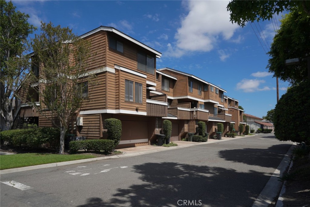 WELCOME TO THIS EXCEPTIONAL FORMER "MODEL" CORNER TOWNHOME UNIT. IDEALLY SITUATED IN A SERENE AND PEACEFUL COMMUNITY JUST STEPS AWAY FROM RESORT-STYLE AMENITIES; INCLUDING A POOL, SPA, TENNIS COURTS, AND CLUBHOUSE. FROM THE MOMENT YOU ARRIVE, THIS HOME SETS ITSELF APART WITH IT'S PREMIUM LOCATION. INSIDE, SOARING CATHEDERAL CEILINGS AND ABUNDANT NATURAL LIGHT CREATE A SENSE OF SPACIOUSNESS AND TRANQUILTY. THE STUNNING ITALIAN IMPORTED CHANDELIER ADDS A TOUCH OF ELEGANCE. THE LIVING ROOM FEATURES A COZY FIREPLACE AND OPENS TO A NEW LARGE DECK (2025), OVERLOOKING A RELAXING POND ADORNED WITH BLOOMING TIGER LILLIES---A PERFECT SPOT FOR YOUR MORNING COFFEE OR EVENING UNWIND. ALSO, ENJOY YEAR-ROUND COMFORT WITH THE NEW HVAC SYSTEM (2024). THE KITCHEN IS EQUIPPED WITH A NEW STOVE (2024), NEW MICROWAVE (2024), AND NEW REFRIGERATOR (2024). UPSTAIRS THE EXPANSIVE PRIMARY ENSUITE SERVES AS A PRIVATE RETREAT, OFFERING AMPLE SPACE AND COMFORT. THE CUSTOMIZED GARAGE IS MORE THAN JUST A PLACE TO PARK---IT'S BEEN TRANSFORMED INTO AN IDEAL ENTERTAINING SPACE, PERFECT FOR GATHERINGS OR A PERSONALIZED WORKSPACE. THIS WONDERFUL HOME HAS BEEN LOVINGLY CARED FOR OVER THE YEARS. IT IS NOW A BLANK CANVASS FOR YOUR PERSONAL CREATIVITY!