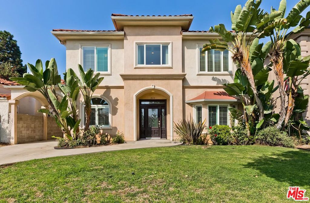 Trust Sale - 1st time available for sale since being built in 2004. This custom one-owner 2sty Contemporary Mediterranean features a laudably logical and flexibly functional floor plan. Sunlit rooms with high ceilings, marble and wood floors. 5 bedrooms and 4 bathrooms upstairs along with a maid's suite downstairs. Dramatic 2sty skylit entry foyer with sweeping staircase and open flow to living, dining, and family rooms. Separate office off of the entry. Lovely powder room. Remarkable chef's center-isle kitchen and family room combination open to the sizable private rear grounds with lawns, mature hedging, and patios. Huge primary suite upstairs with sitting area, office area, large walk-in closet, and luxe marble bathroom with dual vanities and custom stained glass window. 4 separate zones of HVAC. Off-street parking for 3 cars in the front (one covered) with potential for additional parking in the rear off of the alleyway. A tremendous opportunity to purchase a truly wonderful home on the preferred west side of a most coveted quiet upper-200 block moments to the best of the Westside and beyond.