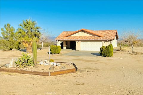 Photo of 6665 Elk, 29 Palms, CA 92277 (MLS # JT25259446)