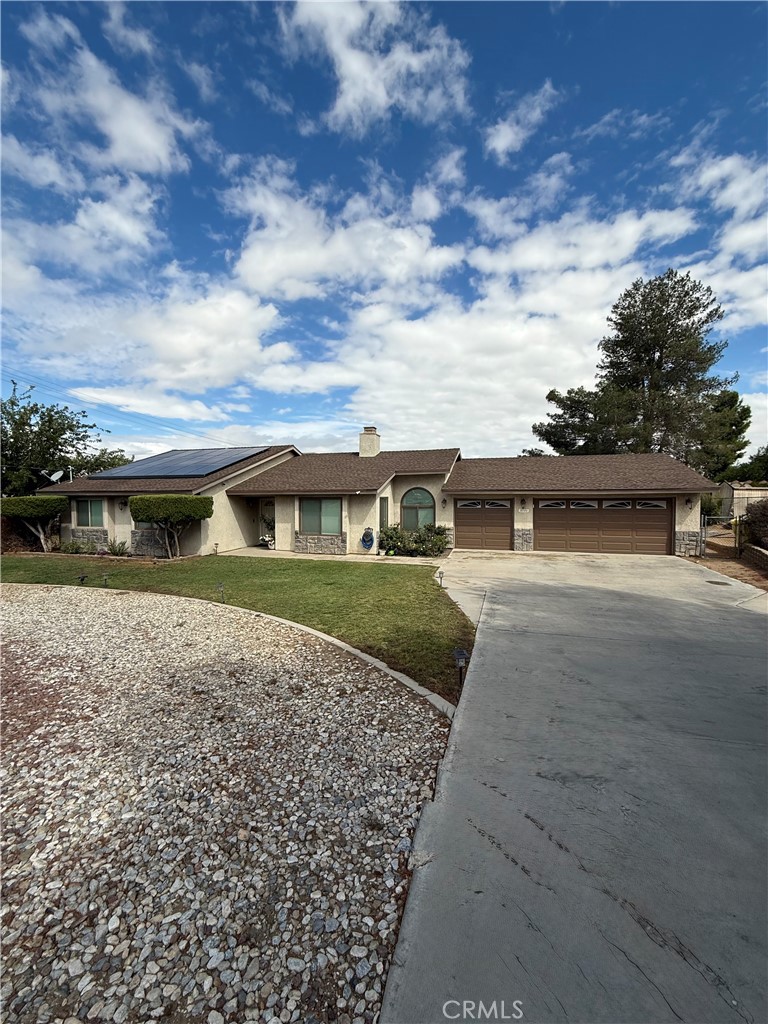 Welcome to this charming single-story home in Hesperia, set on a spacious .65 acre horse property lot. The property is fully fenced with wrought iron and block wall, surrounded by mature shade trees, lush landscaping, and features leased solar panels to help you save for years to come, all paired with a convenient 3-car garage.
Step inside and you’ll immediately notice the tall ceilings and open layout. The home offers a large living room with a double-sided fireplace, a cozy family room, a formal dining area, and a spacious kitchen with tile counters, stainless steel dishwasher and stove, recessed lighting, and multiple skylights for natural brightness. There’s also a breakfast nook with bay windows, an indoor laundry room with storage, and a guest-friendly half bath. The bedrooms are generously sized, each with ceiling fans, while the primary suite boasts direct access through a sliding glass door to the huge covered patio, perfect for enjoying desert sunsets, morning coffee, or weekend BBQs. The backyard features plenty of room to entertain all year long.
This home checks all the boxes and won’t last long in today’s market. Don’t wait, make it yours before it’s gone!