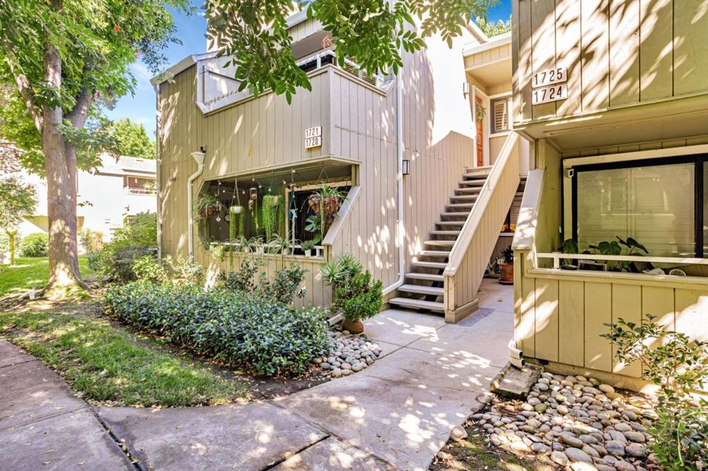Remodeled top floor unit in desirable Hamilton Place! This light filled home features spacious vaulted ceilings, plantation shutters, recessed lighting, and designer touches throughout. The updated kitchen offers granite countertops, abundant cabinet storage, and stainless steel appliances. Enjoy meals in the dining area with its tray ceiling detail and elegant chandelier. The primary suite includes a walk-in closet, vaulted ceiling, and a modern glass shower. A spacious hall bath, indoor laundry with washer/dryer, private patio, detached 1 car garage with storage, plus an additional assigned parking space add to the convenience. Central air conditioning ensures year round comfort. Set within the highly sought after Hamilton Place community, residents enjoy resort-style amenities including a pool, spa, clubhouse, and lush greenbelt walking paths. Ideal location-just minutes from freeways 880, 17, and 85 for easy commuting, with nearby shopping and dining at The Pruneyard, Whole Foods, and Trader Joes, plus outdoor recreation along the Los Gatos Creek Trail. Whether relaxing by the pool, enjoying your modern kitchen, or cozying up by the fireplace, this unit truly has it all.