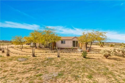 Photo of 492 Surrey Avenue, Landers, CA 92284 (MLS # JT26028273)