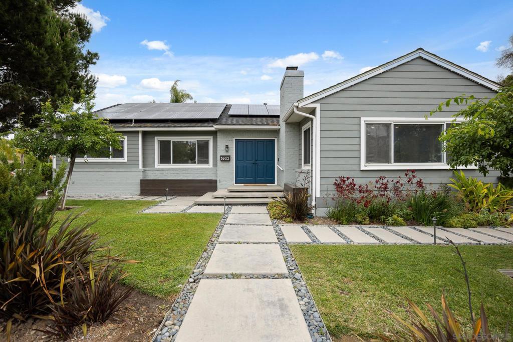 This perfectly situated home in the desirable Loma Portal community, located just steps from the charming Plumosa Park, boasts hidden depths of character and luxury. The main level lives like a single-story home with an open layout featuring the kitchen, dining area and great room, as well as three spacious bedrooms including the primary suite with a beautifully renovated bath. Perched at the top of the Wing Street canyon, the home extends down to a second level of living space including two additional bedrooms, a full-sized bath, and a generously sized living room with private entrances. Plus, there is also a massive basement offering endless possibilities. Every bedroom in the home is impressively sized, with ample closet space, quality finishes, and thoughtful design. Original hardwood flooring, elegant details, and large picture windows fill the home with natural light and warmth, and paid-off solar that adds efficiency and long-term value. The downstairs living room opens to a private backyard oasis, with mature fruit trees and pops of color that change throughout the seasons. This luxurious hidden feature includes two large decks, a gourmet outdoor kitchen, built-in spa and an elegant gas fire table. This home is truly at the heart of the neighborhood no matter the season. Revel in the energy at Halloween, be dazzled by Sea World’s fireworks, and be enchanted by the neighborhood luminaries on Christmas Eve. A home that’s rich in character, full of possibility, and undeniably Loma Portal. Come see it for yourself!